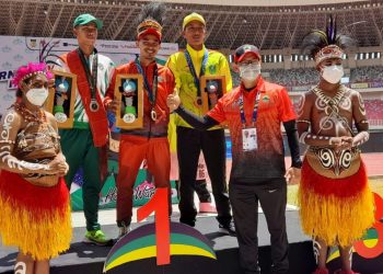 Rifki Ahmad Cetak Rekor Peparnas XVI Papua, Guru Ngaji yang Hobi Lari