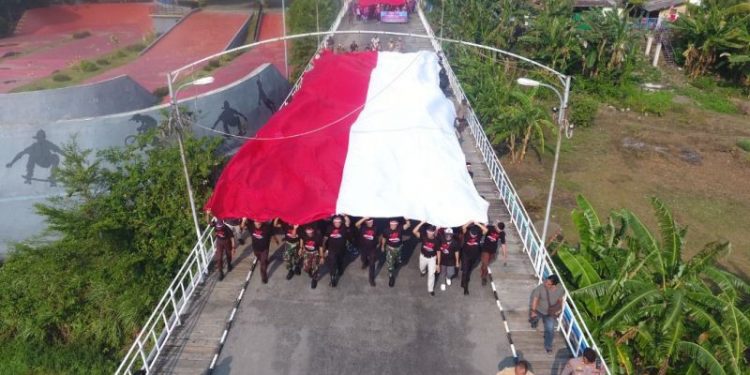 Kirab Bendera digelar oleh Pemuda LDII Kediri. Foto: LINES.