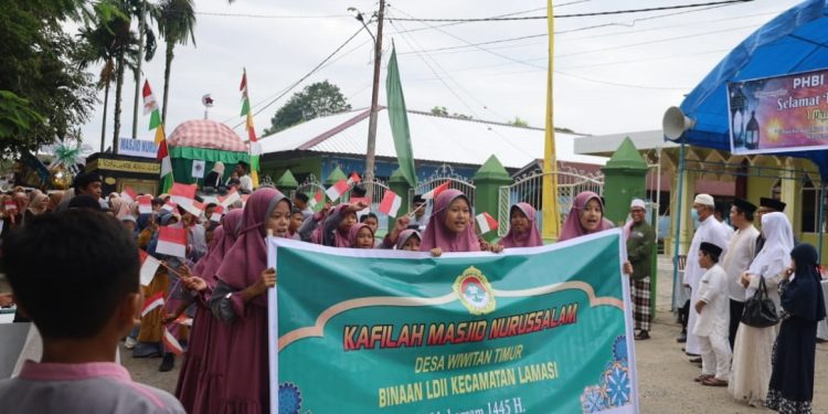 LDII Lamasi menghadiri undangan Kantor Urusan Agama (KUA) Lamasi pada kegiatan Karnaval 1 Muharam 1445 H. Foto: LINES.
