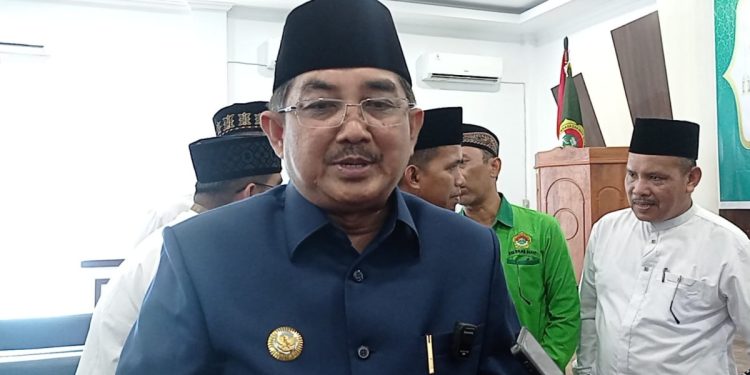Bupati Anwar Sadat hadir di Musda V LDII Tanjung Jabung Barat, di Gedung PKK Kota Kuala Tungkal, pada Minggu. Foto: LINES.