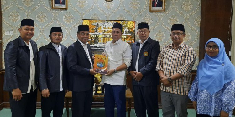 Ketua DPW LDII Sumatera Utara, Hasoloan Simanjuntak beserta jajaran berkunjung ke Kantor Wilayah Kementerian Agama (Kanwil Kemenag) Sumatera Utara, pada Jumat (2/8). Foto: LINES.