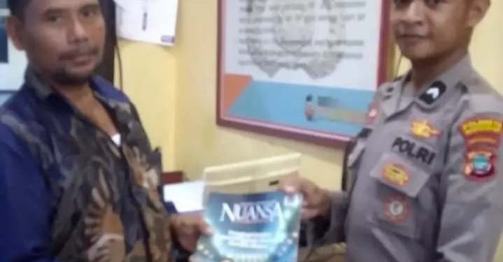 Pengurus PAC LDII Kampung Udapi Hilir, Distrik Aimas, Manokwari, Papua Barat silaturahim dengan stakeholder dan membagikan Majalah Nuansa Persada edisi November 2024. Foto: LINES.