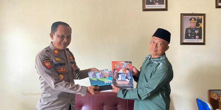 PC LDII Gadingrejo silaturahim Kapolsek Gadingrejo Iptu Herman. Foto: LINES.