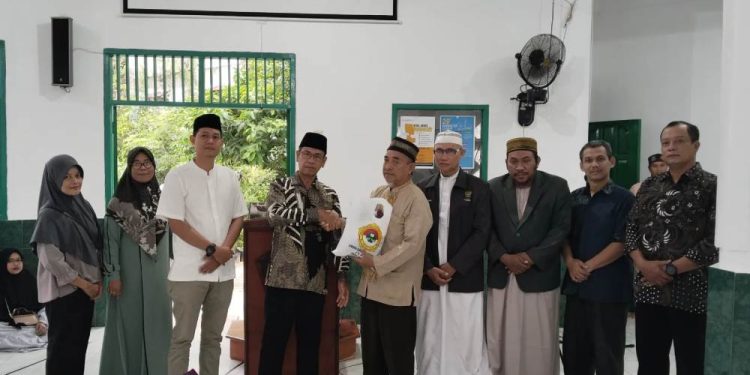 PC LDII Bontang Selatan menggelar acara “Buka Bersama dan LDII Berbagi” di Masjid Warosatul Anbiya, Berbas Pantai, Bontang. Foto: LINES.