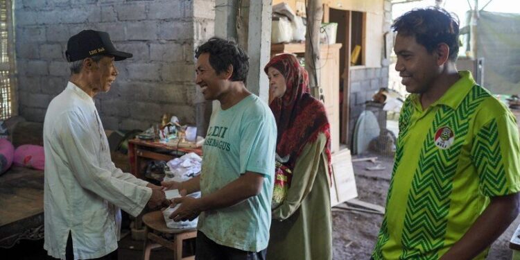 LDII Bali memberi bantuan terdampak korban banjir. Foto: LINES.