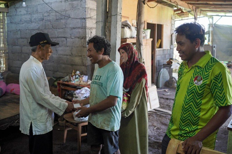 LDII Bali memberi bantuan terdampak korban banjir. Foto: LINES.