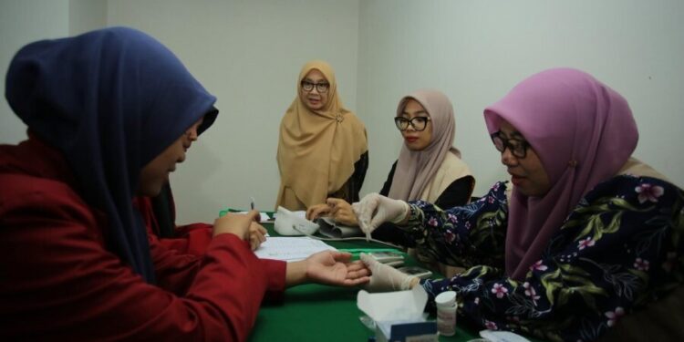 Departemen PPKK DPP LDII membuka booth pengecekan kesehatan gratis. Foto: LINES.