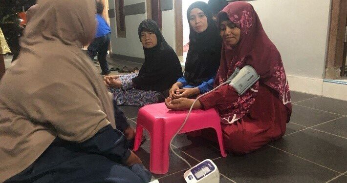 PAC LDII Sukoharjo menggelar kegiatan Cek Kesehatan Gratis (CKG) bagi warga sekitar di Sleman, Daerah Istimewa Yogyakarta. Foto: LINES.