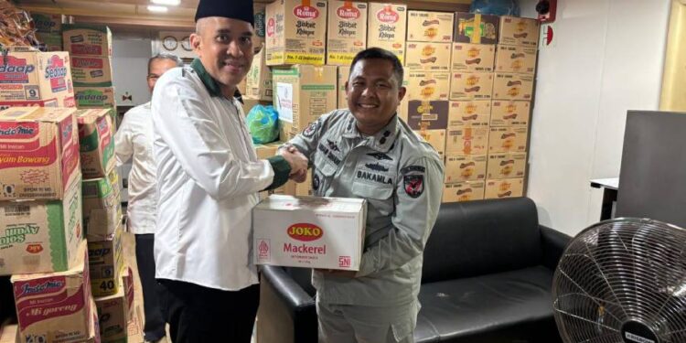 LDII Kepri menyerahkan bantuan kemanusiaan ke Aceh. Foto: LINES.