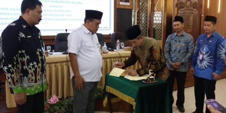 Pemerintah Kabupaten Blora dan DPD LDII Blora menandatangani kesepakatan bersama terkait pengembangan pertanian organik. Foto: LINES.