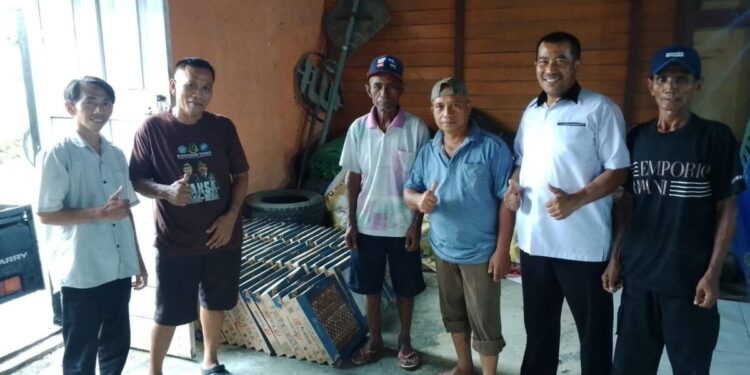 Dewan Pimpinan Daerah (DPD) Lembaga Dakwah Islam Indonesia (LDII) Kabupaten Bolaang Mongondow mendukung pembangunan infrastruktur desa melalui penyaluran bantuan material kepada masyarakat. Foto: LINES