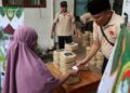 Kurangi Sampah Plastik, LDII Depok Bagikan Daging Kurban dengan Besek