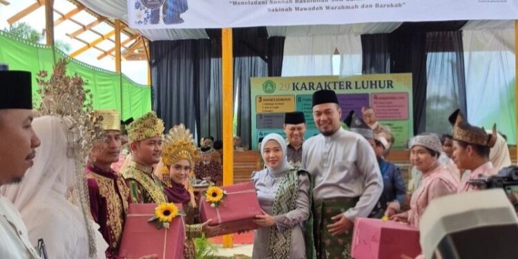 Lembaga Dakwah Islam Indonesia (LDII) Kabupaten Indragiri Hulu (Inhu), Provinsi Riau menggelar syukuran Nikah Massal, di Pesantren Nurul Haq, Kelurahan Tanjung Gading, Kecamatan Pasir Penyu, pada Minggu (31/05/2026). Foto: LINES