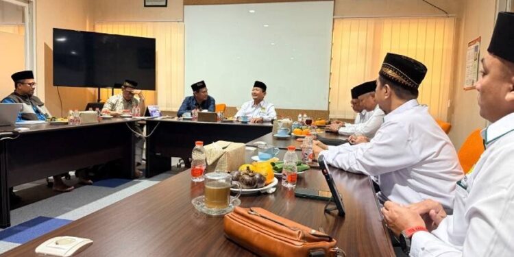 LDII Gresik bersilaturrahim dengan PD Muhammadiyah Gresik. Foto: LINES.